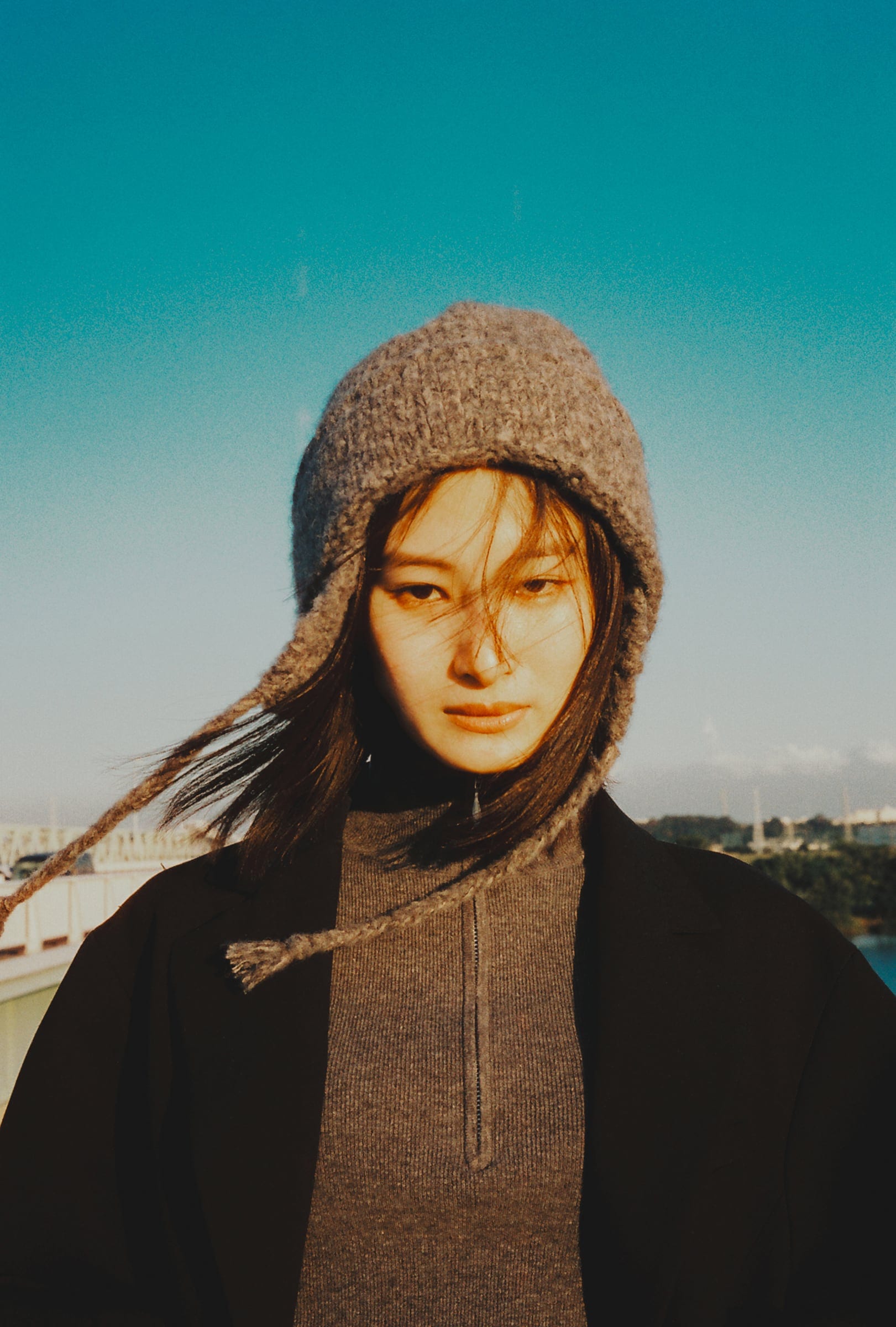 Ricca portrait beneath blue sky
